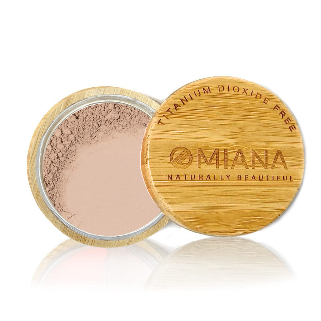 Omiana vegan Loose Powder Mineral Makeup Titanium Dioxide-Free Mica-Free in an Open bamboo container with a bamboo lid on a white background