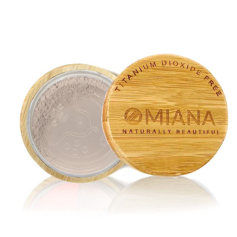 Omiana titanium Dioxide-free mineral  powder makeup with a bamboo lid on a white background